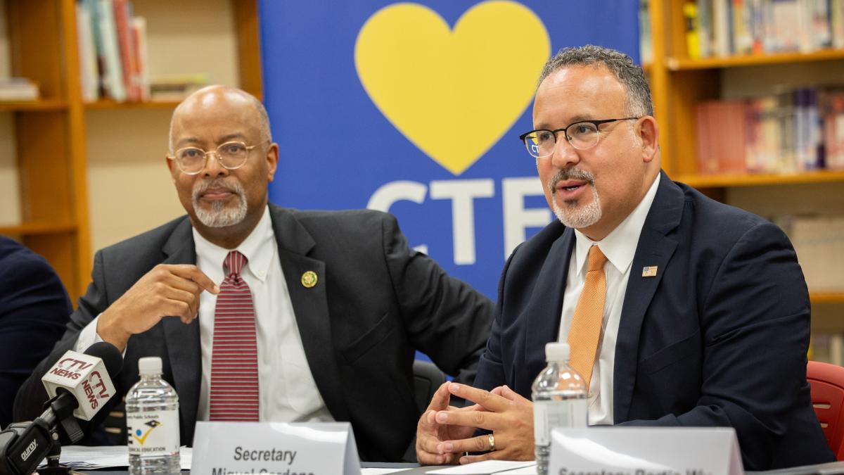 Congressman Glenn Ivey and Education Secretary Miguel Cardona discuss CTE programs during a press conference at Crossland High School on August 2, 2023.
