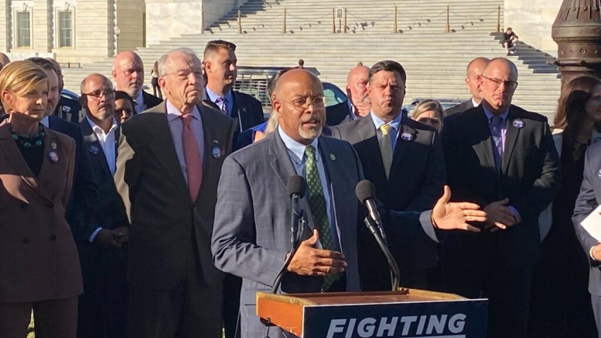 Congressman Glenn Ivey speaks at a press conference in front of the US Capitol Building.
