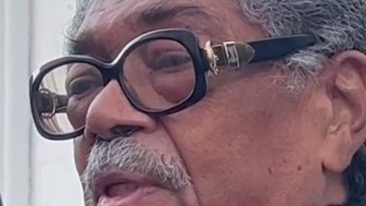 A photo of Tommie Broadwater being interviewed in his later years.