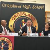 Maryland Rep. Glenn Ivey (left) is joined by U.S. Secretary of Education Miguel Cardona (center) and Maryland Secretary of Labor Portia Wu at Crossland High School to talk about trade programs and what they can do for students. (Anthony Tilghman/The Washington Informer)