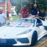 Congressmen Glenn Ivey and Steny Hoyer wave from a Corvette convertible during the 2022 Labor Day Parade.